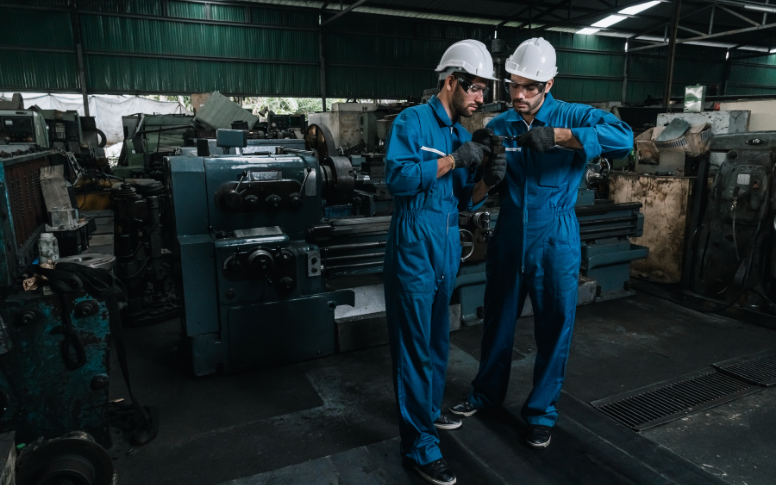 industrial worker in custom coveralls and hard hat