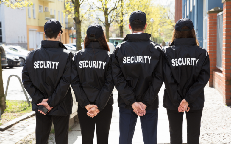 security staff in black security uniform