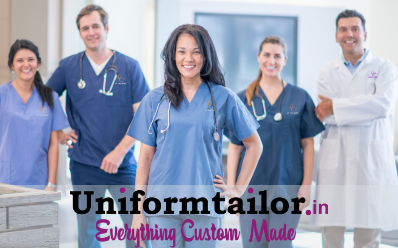 hospital staff in logo embroidered matching scrub set and doctor apron