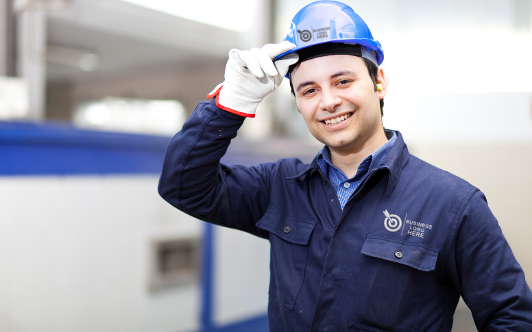 worker wearing full protective work uniform overall, gloves and hard hat